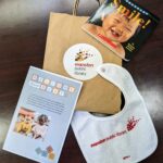 Welcome Baby kits include a baby book, EPL bib, and other resources